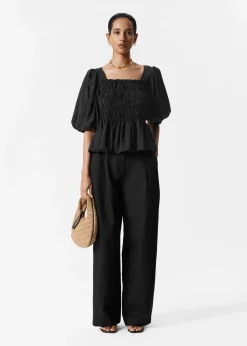 & Other Stories Gesmokte Bluse mit Puffärmeln