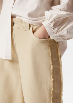 & Other Stories Jeans mit weitem Bein und Fransen
